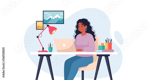 A focused woman works remotely on her laptop at a cozy home office desk. Ideal for concepts like productivity, online learning, creativity, business, and modern lifestyle.
