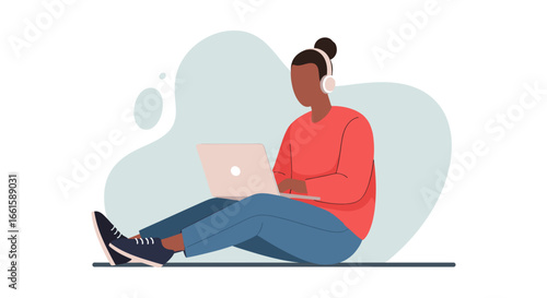 Relaxed person working remotely on a laptop while listening to music with headphones. Ideal for concepts of online learning, freelance work, or digital lifestyle.