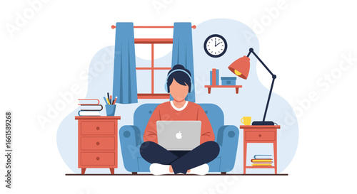 Person working remotely on laptop at home, seated comfortably in an armchair with headphones. Ideal for concepts of telecommuting, online education, or leisure. Stay productive.