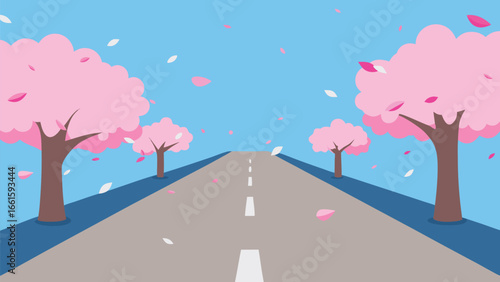 Peaceful spring avenue lined with blooming cherry blossom trees and falling petals