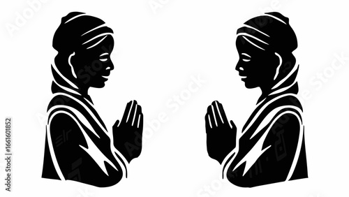 Two identical black silhouette figures facing each other with hands in prayer position on white background