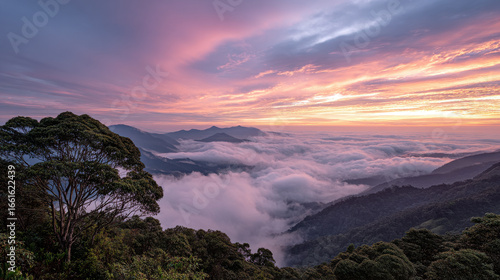 breathtaking mountain sunrise where first light of day paints sky in shades of gold and pink