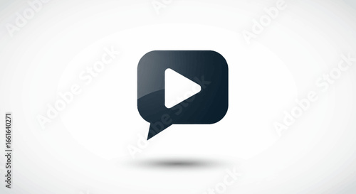 Dark speech bubble icon with play button, signifying video message or communication.