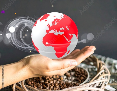 A hand holds a graphic globe, surrounded by coffee beans and a softly lit background