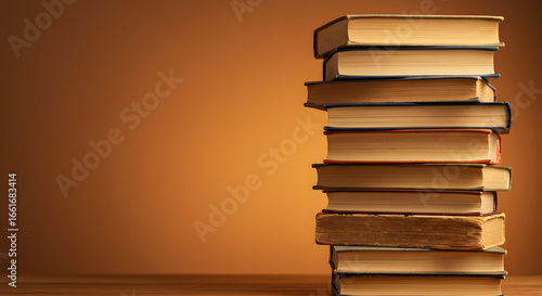 Stack of Books: A towering stack of vintage books casts a warm, inviting glow against a sepia-toned backdrop, evoking the rich allure of knowledge.