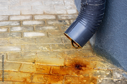 Rust Stains from the Downspout on Paver Surface and Texture