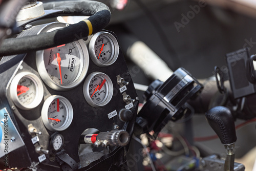 Dials on a dashboard of a race car