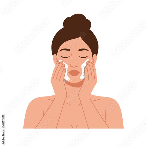 A young woman with a bun hairstyle gently cleanses her face with foamy cleanser, illustrating a daily skincare routine for beauty and hygiene.