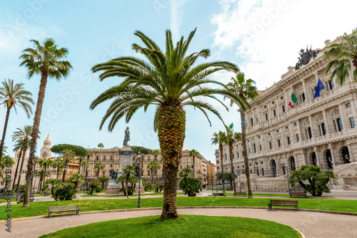 Obraz na plátne Palm tree in Piazza Cavour square in Rome, Italy, with Palace of Justice and his