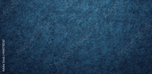 Deep blue textured surface background.