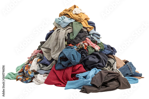 Towering stack of diverse garments showing various fabrics colors and clothing types in disorganized heap, isolated on a transparent background