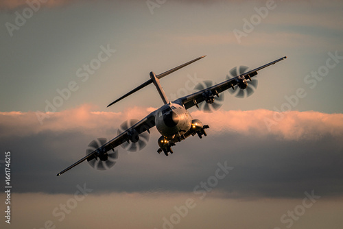 Photos French Air Force Airbus A400M front view in flight at golden hour