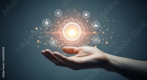 Human Hand Holding Glowing Digital Network of Interconnected Gears and Icons.