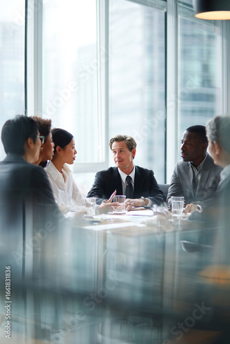 Business men and women wearing suit or formal outfit, discussing at their meeting with co-worker and client at   modern office in urban building. 
