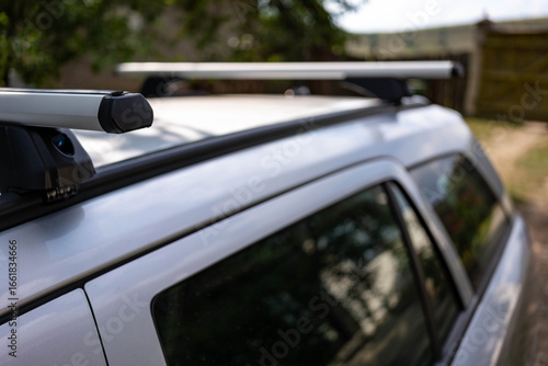 Aluminium lockable cross bars, roof rack on a station wagon.