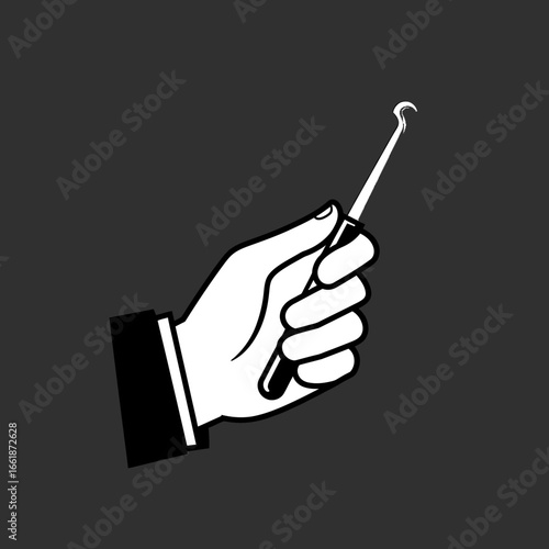 Hand holding a dental tool against a dark background, symbolizing dental care and hygiene practices