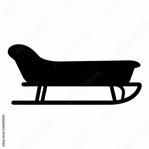 A traditional wooden toboggan or sled, ready for winter adventures