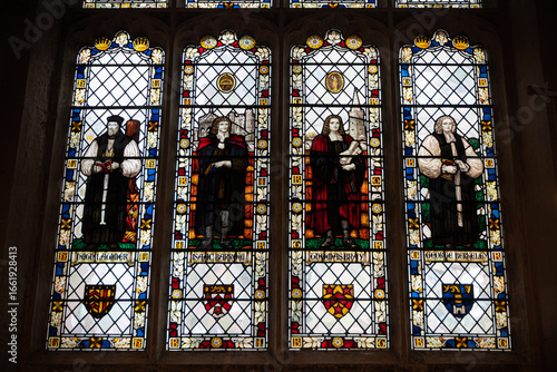 Cambridge, England. Stained-glass window in the north chapel of Great St Mary's featuring figures of Hugh Latimer, Isaac Barrow, Thomas Bray and George Berkeley