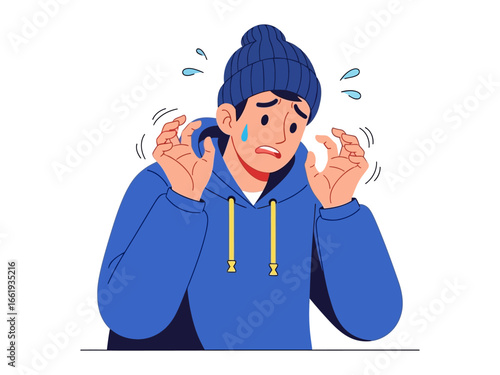 Freezing in Fears: A young male with a tear on his face shivering in cold weather. Depicting fear, anxiety, and dread in the frosty atmosphere.