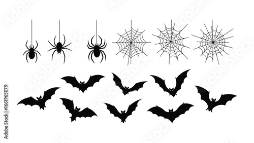 Halloween-themed decorations: A collection of intricate silhouettes of spider, spider web and bat decorations for use during the halloween holiday 