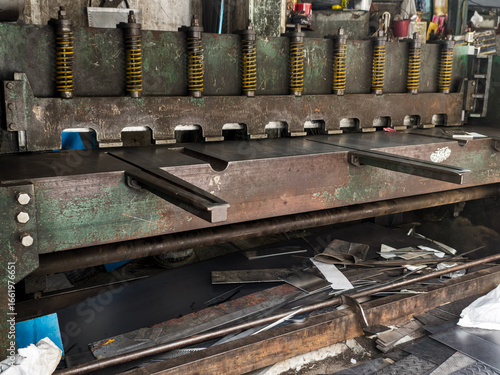 Old Industrial guillotine shear with reinforced blade for metalsheet cut in a structural steel plant