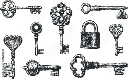 Collection of ornate antique keys and a vintage padlock