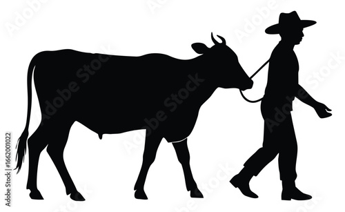 Silhouette of a farmer walking a cow creating a timeless rural scene with vintage charm