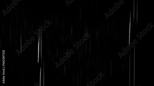Rain streaks falling vertically against a black background