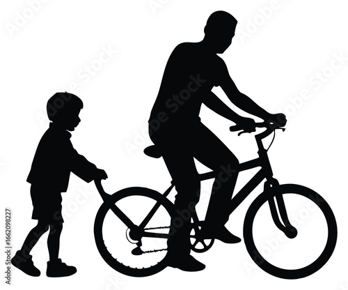 Silhouette of father riding bicycle with son pushing bicycle learning to ride