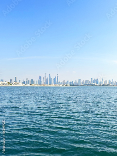Dubai Skyline A Coastal View of the City's Modern Architecture Under a Clear Blue Sky