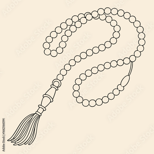 Islamic prayer beads or rosary with a tassel and decorative beads on a light background