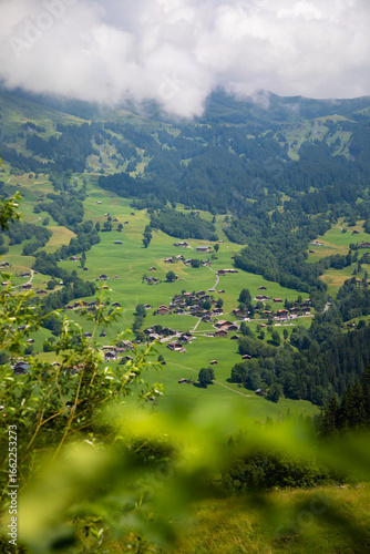 valley landscape with small village in the distance