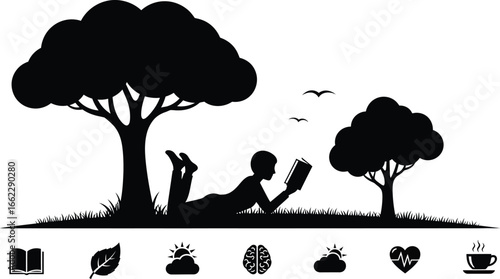 Person relaxing outdoors reading a book under a tree