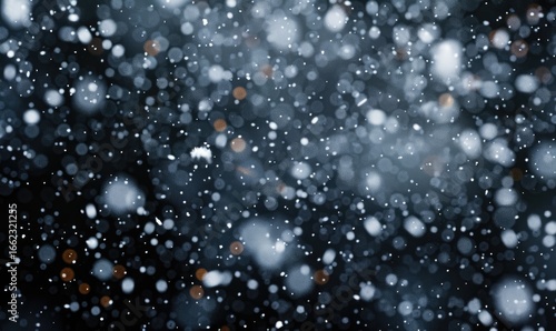 Abstract winter scene with snowflakes and bokeh
