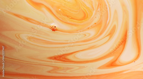 Top view of mixture black tea and milk