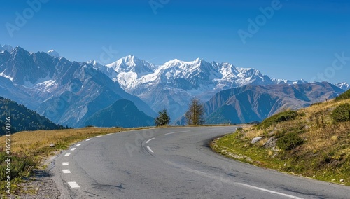Mountain road winding through Alpine pass, scenic view, travel