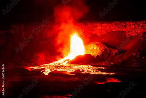 Lava fountains erupt from Halemaʻumaʻu crater during Episode 24 of Kīlauea Volcano's eruption on June 4, 2025, in Hawaiʻi Volcanoes National Park, Big Island, Hawaii.