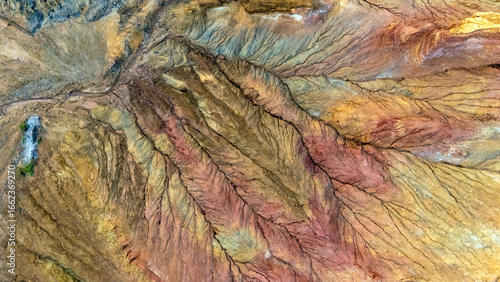 Aerial view of the arid, colorful earth of the abandoned Mazarrón mine, Murcia Region, Spain.