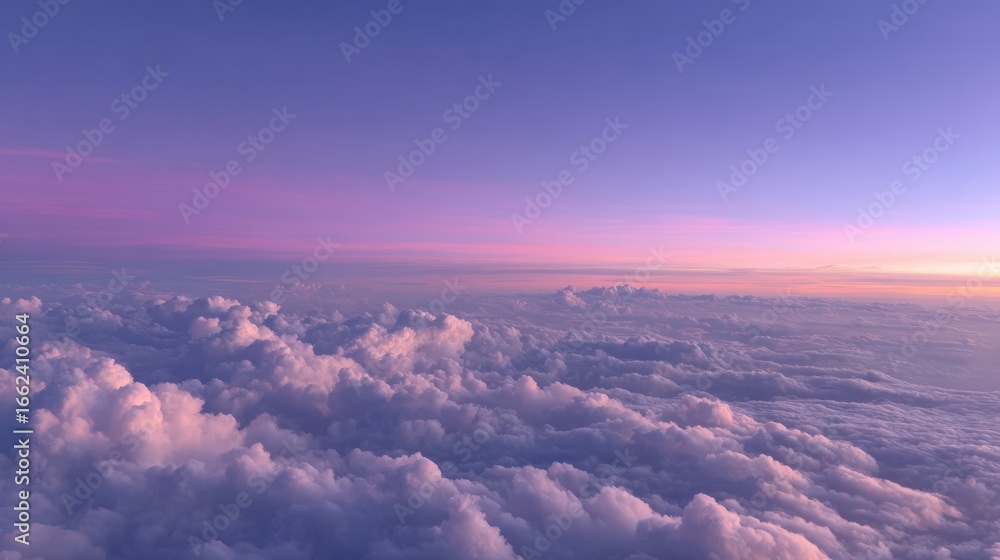 Fototapeta premium Aerial view of a cloudscape, painted with soft pastel hues of pink, purple and blue