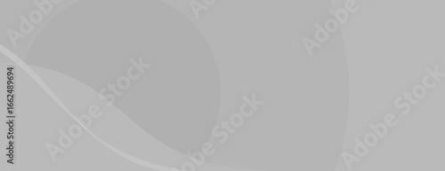 Minimalist gray background with smooth, flowing curves. The gray background has a soft, modern texture. Wave background vector. Gray background.