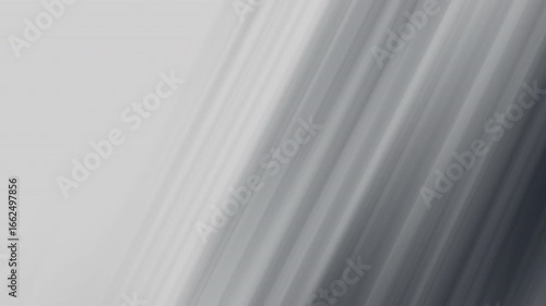 Diagonal gray and white blurry lines create a stylish pattern suitable for backgrounds, website design, or abstract graphic projects.
