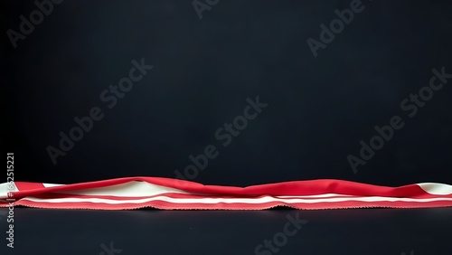 Vintage American flag border on a dark surface, minimalist patriotic decor with soft natural lighting.
