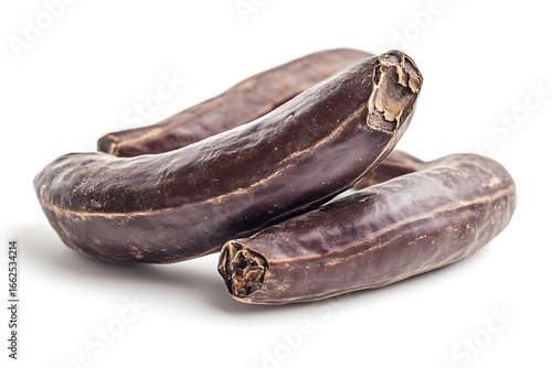 Wallpaper Mural Carob Pods Heap Isolated Closeup on White Backdrop, Brown Sweet Legumes Texture Torontodigital.ca