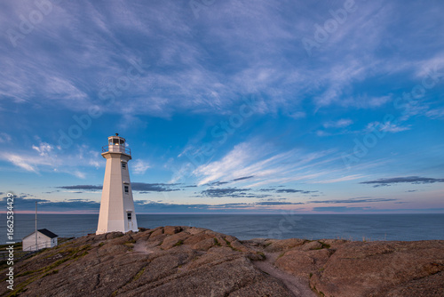 Cape Spear, Newfoundland lighthouse at sunset with a dramatic sky