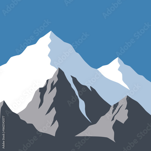 Majestic SnowCapped Mountain Peaks Under Clear Blue Sky.