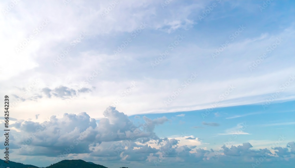 Fototapeta premium Cloudscape with a light blue sky