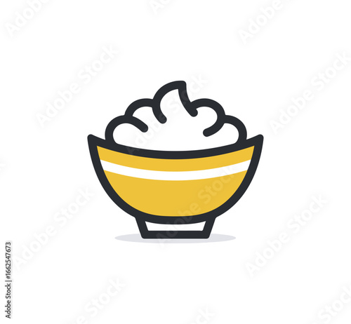Whipped cream in yellow bowl