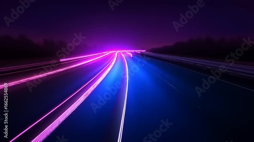 Vibrant light trails on a highway at night, showcasing dynamic motion and colorful illumination