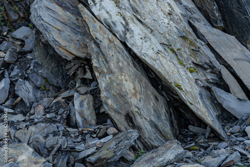 Slate and Graywacke. Slate is a fine-grained, foliated, homogeneous, metamorphic rock. Shotgun Cove Trail, Whittier is a city at the head of the Passage Canal in the Chugach Census Area in Alaska.