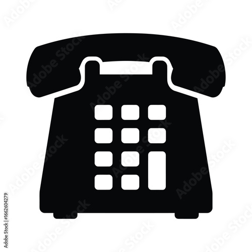Black silhouette of an oldfashioned rotary telephone, isolated on a, representing communication and connection